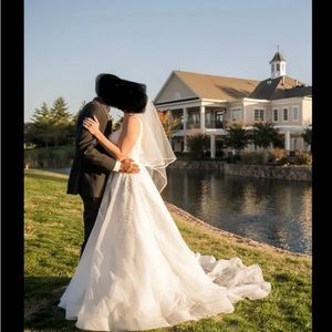 Worn once …Pictures are my actual wedding pictures of me in the dress.